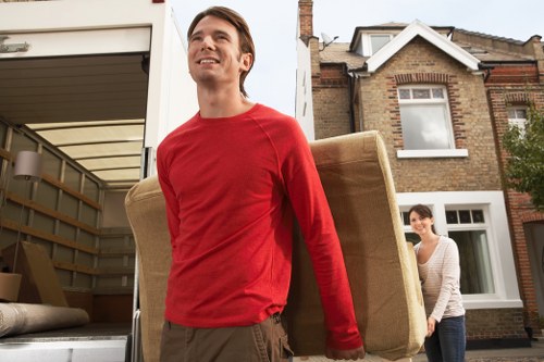 Professional moving team loading a truck